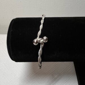 Vintage Silver twist Bracelet. Bangle. Unique clasp.